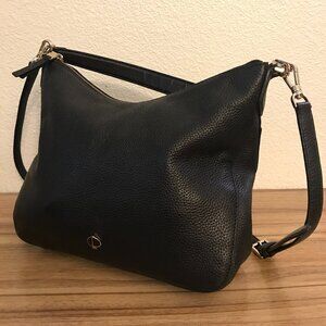 Kate Spade Crossbody. Minor stains on interior. Normal wear.
